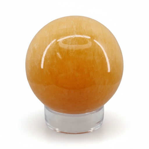 Orange sphere with a clear base on a white background