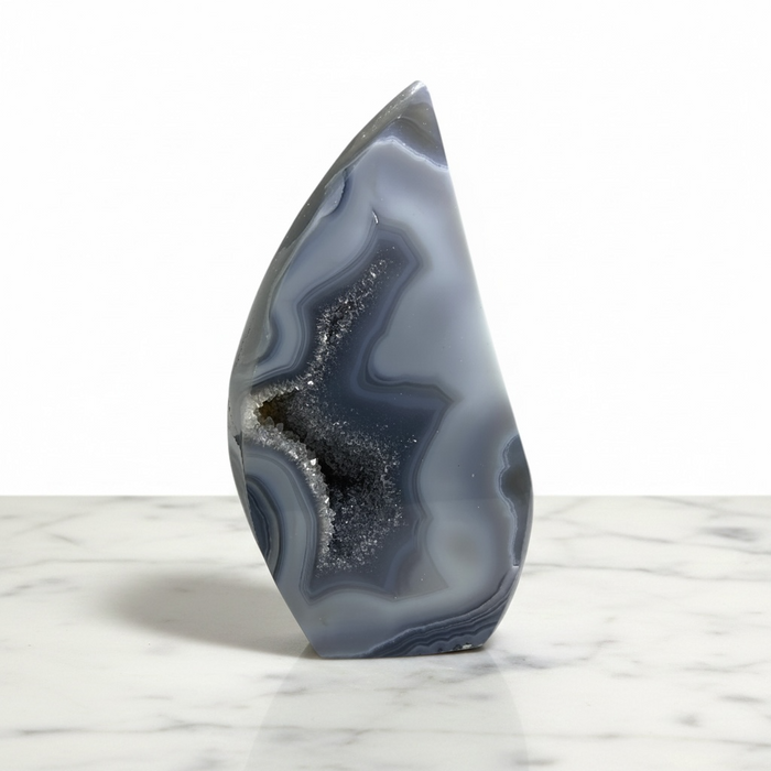 Kindred Crystal Collective — Agate Druzy Flame, polished grey banded agate flame with dark druzy cavity, variant 1 full view on white background