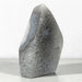 Kindred Crystal Collective — Natural Grey Agate Flame with Druzy Centre, freestanding flame-shaped stone with grey banding and polished and naturally textured surfaces.