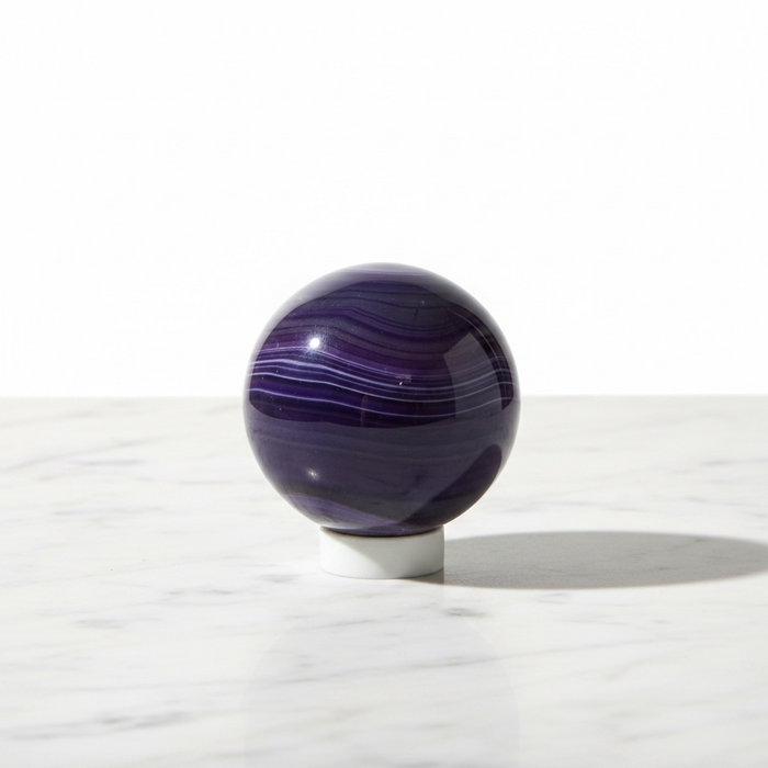 Agate sphere showing natural banded chalcedony patterning, 278g, a healing crystal for steady energy and harmony
