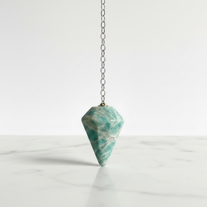 Amazonite crystal pendulum in pale blue-green, a calming healing crystal for harmony and balanced expression