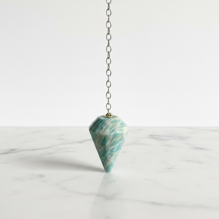 Natural light amazonite faceted pendulum in soft blue-green tones, used for dowsing and calm communication