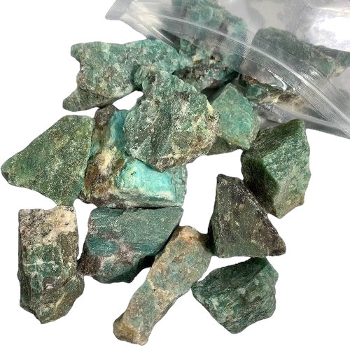 Kindred Crystal Collective — Amazonite Rough 1KG, raw blue-green amazonite chunks spilling from a clear bag on white background