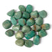 Kindred Crystal Collective — Amazonite Tumbled 2–2.5cm, polished sea-green and turquoise stones with creamy streaks and occasional earthy patches on a white background.
