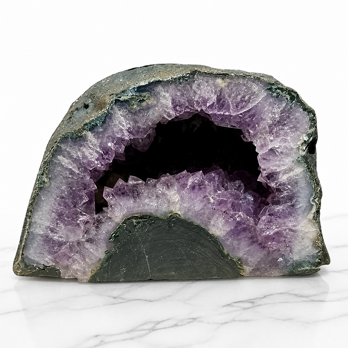 Kindred Crystal Collective — Amethyst Cave, natural amethyst cave geode with enclosed cavity of deep violet quartz crystal points, 18.1x12.8x10.1cm
