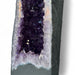 Kindred Crystal Collective — Amethyst Cave With Calcite Inclusion, close-up detail of natural calcite inclusion within rich violet Uruguayan amethyst cave