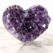 Kindred Crystal Collective — Amethyst Cluster Heart, large natural Amethyst druzy crystal heart with deep violet points and polished outer edge, displayed upright on white marble surface