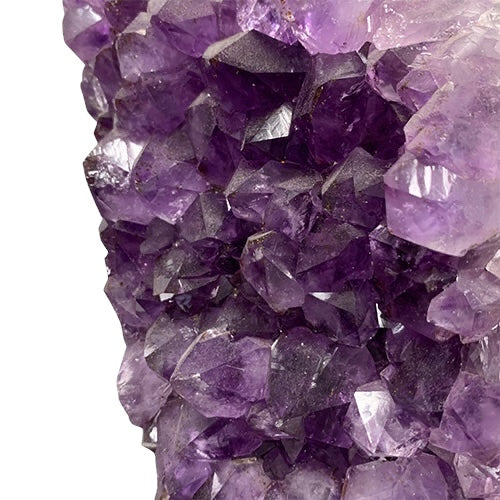 Kindred Crystal Collective — Amethyst Cluster on Stand, close-up of large faceted deep purple Amethyst crystal points with natural lustre and internal depth
