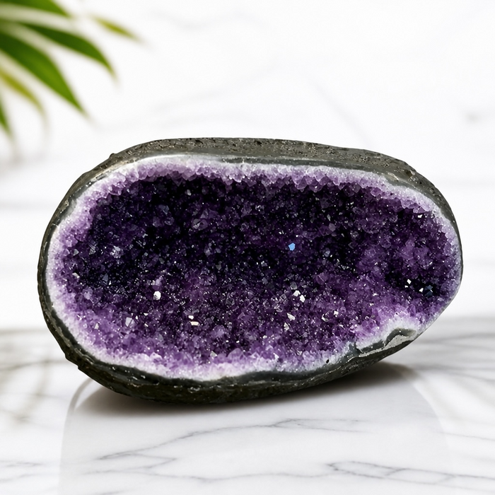 Kindred Crystal Collective — Amethyst Geode, large natural amethyst geode with rugged outer shell and deep violet quartz crystal interior, 17.5x14.5x11.5cm