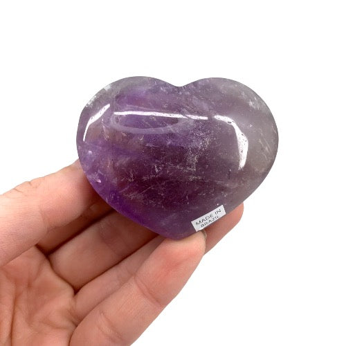 Kindred Crystal Collective — Amethyst Heart, polished deep purple amethyst heart, size reference held in open palm, white background