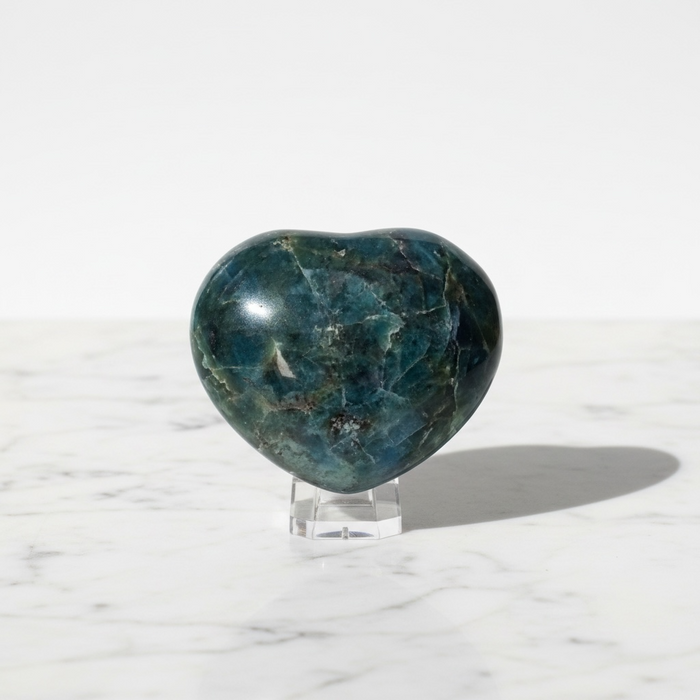 Natural apatite carved crystal heart in vibrant blue-green, 261g, for self-expression, clarity and creative inspiration