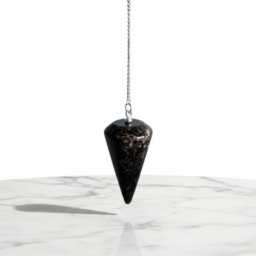Natural astrophyllite faceted pendulum with dark base and golden-bronze metallic inclusions, used for dowsing and energy work