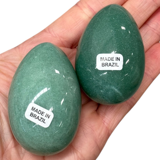 Kindred Crystal Collective — Aventurine Egg, two polished green aventurine eggs from Brazil, size reference held in open palm
