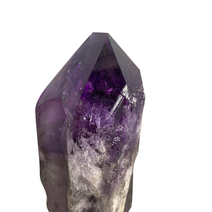 Kindred Crystal Collective — Bahia Amethyst Point, side view of natural Bahia amethyst point showing rich purple saturation and natural base