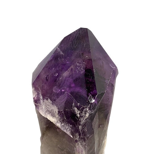 Kindred Crystal Collective — Bahia Amethyst Point, side view of natural Bahia amethyst point showing rich purple saturation and natural base