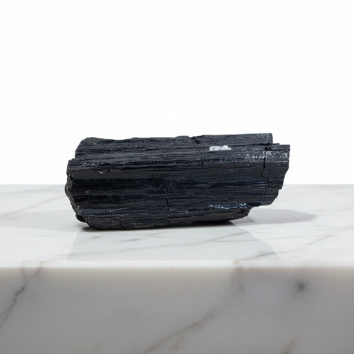 Kindred Crystal Collective — Black Tourmaline Schorl, raw striated black tourmaline specimen, front view on white background