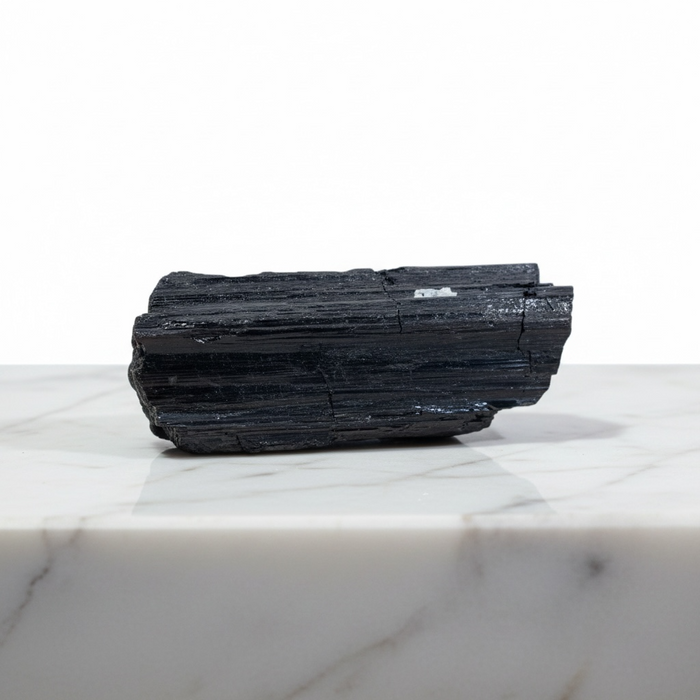 Kindred Crystal Collective — Black Tourmaline Schorl, raw striated black tourmaline specimen, front view on white background