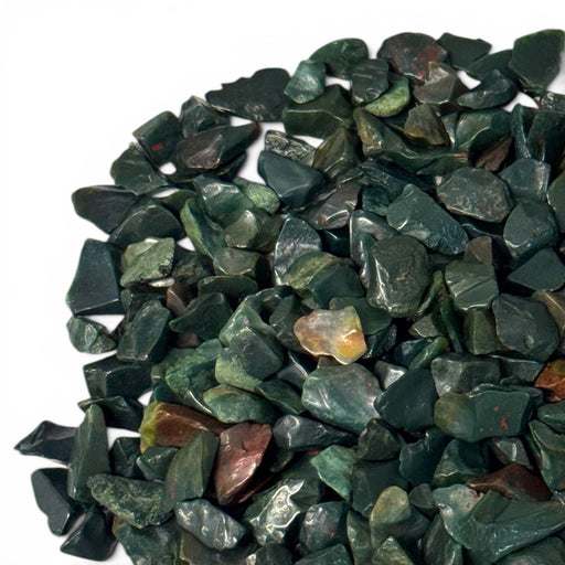 Kindred Crystal Collective — Bloodstone Chips 500g, close-up of tumbled dark green heliotrope chips with characteristic red orange and yellow iron oxide inclusions