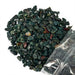 Kindred Crystal Collective — Bloodstone Chips 500g, tumbled deep green bloodstone chips with red and orange jasper inclusions poured from clear bag on white background