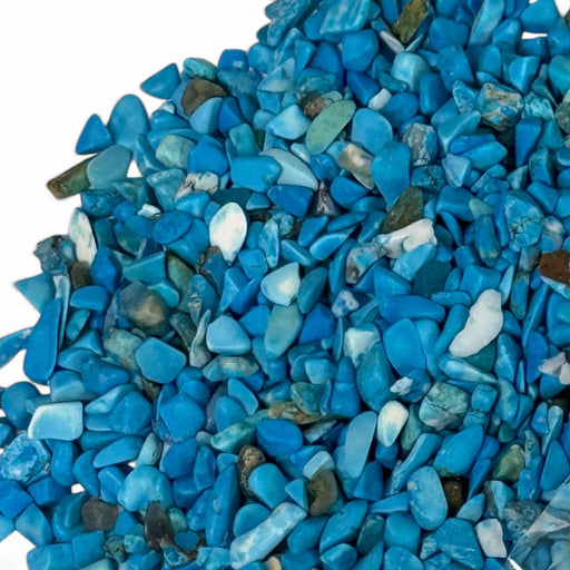 Kindred Crystal Collective — Blue Howlite Chips 500g, close-up of tumbled turquoise-blue howlite chips with natural white and grey matrix detail