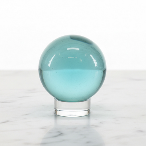 Blue Obsidian Sphere — polished teal volcanic glass sphere on display stand