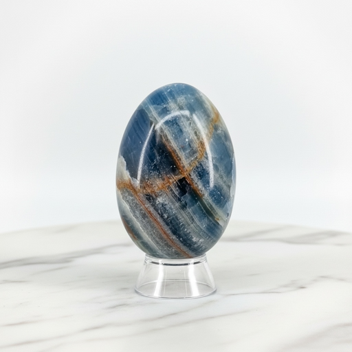Natural blue onyx crystal egg in deep blue with smooth polished finish, for throat chakra healing, emotional calm and good fortune