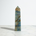 Blue onyx crystal tower 114g showing deep blue banding and pointed apex, for concentration, anxiety relief and happiness