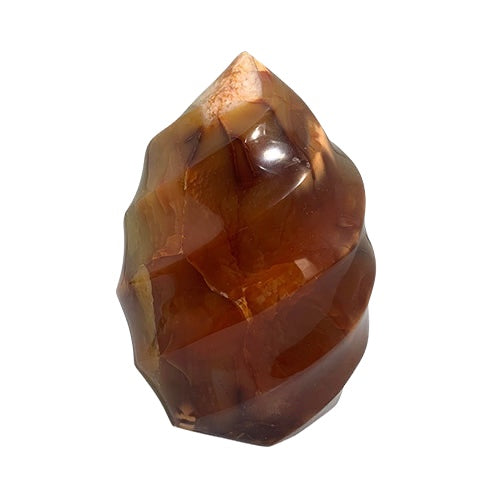 Kindred Crystal Collective — Carnelian Flame, polished faceted Carnelian flame carving showing rich burnt orange to amber translucency and sculptural asymmetric silhouette, white background