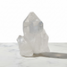 Kindred Crystal Collective — Clear Quartz Cluster, close-up of brilliant transparent clear quartz points with natural inclusions and rainbow refraction