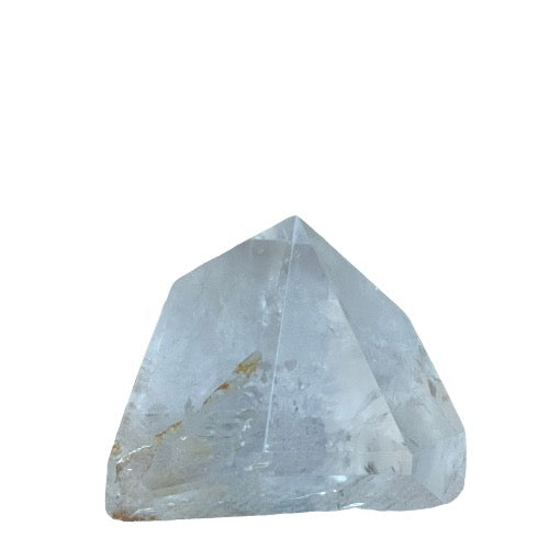 Clear quartz generator close-up showing natural inclusions and luminous transparency, a master healer crystal for intention setting and crystal grids