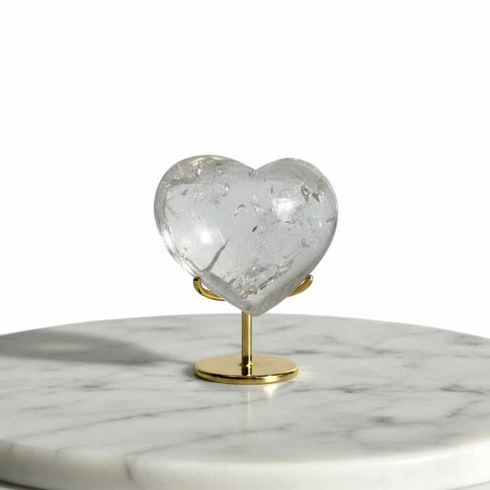 Kindred Crystal Collective — Clear Quartz Heart Brazil, medium polished transparent clear quartz heart with natural inclusions