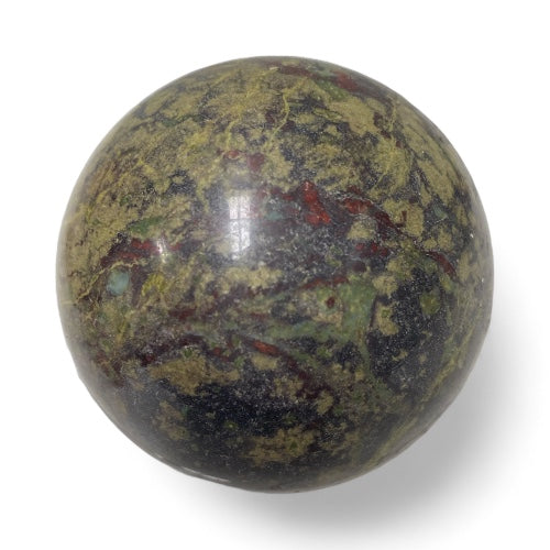 Dragon blood jasper crystal sphere close-up revealing deep red and green natural stone markings, used for courage and protection