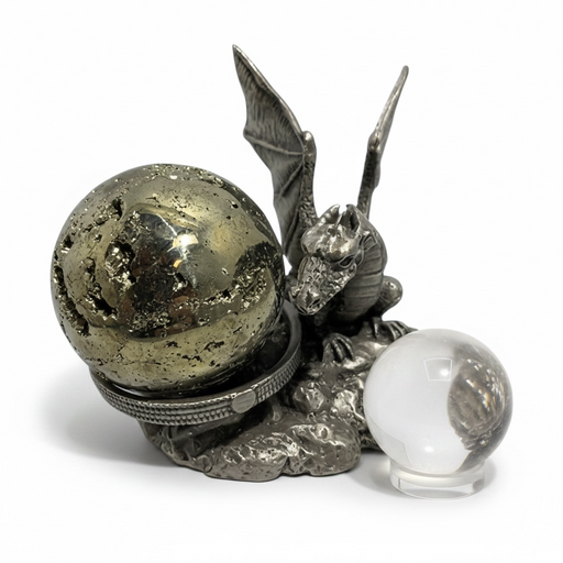 A sculptural pewter piece that cradles your crystal sphere within the powerful presence of a dragon.