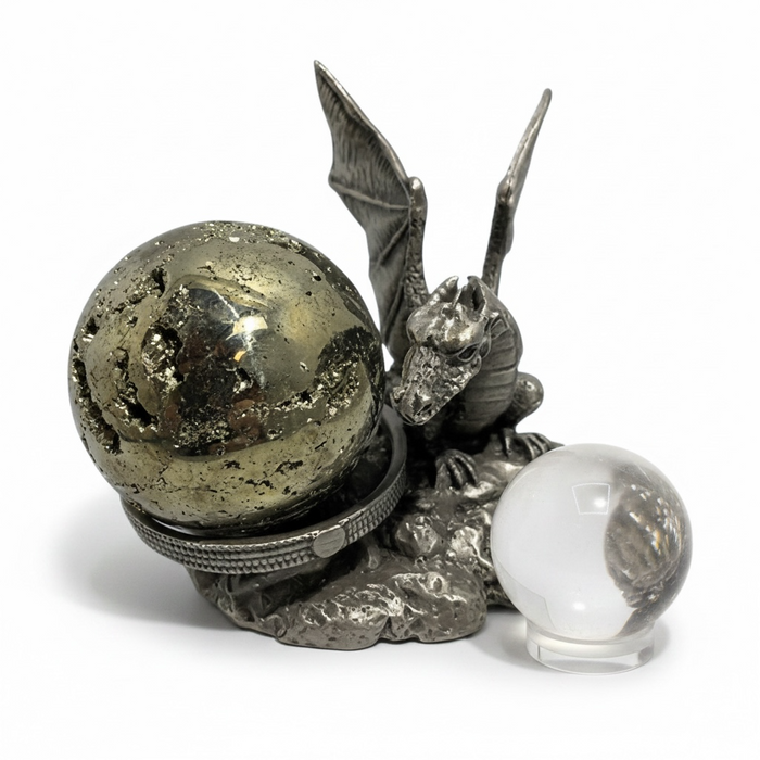 A sculptural pewter piece that cradles your crystal sphere within the powerful presence of a dragon.