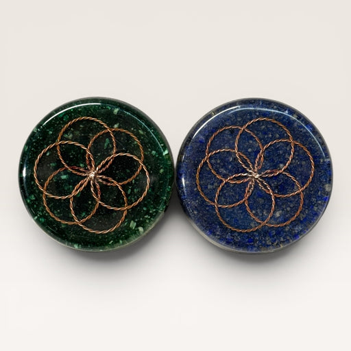 Kindred Crystal Collective — Flower of Life Orgonite Charging Plate 9cm, two handcrafted resin plates with twisted copper Flower of Life design, green malachite and blue lapis lazuli chip varieties, white background