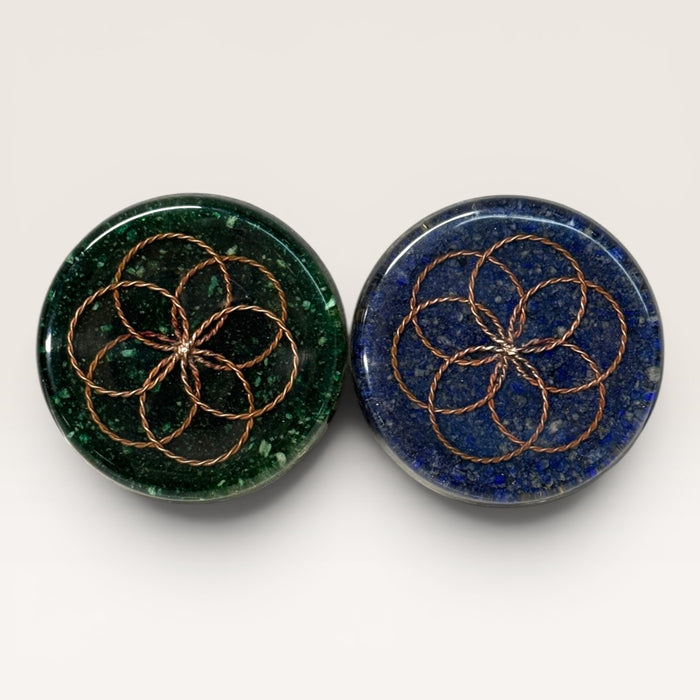 Kindred Crystal Collective — Flower of Life Orgonite Charging Plate 9cm, two handcrafted resin plates with twisted copper Flower of Life design, green malachite and blue lapis lazuli chip varieties, white background