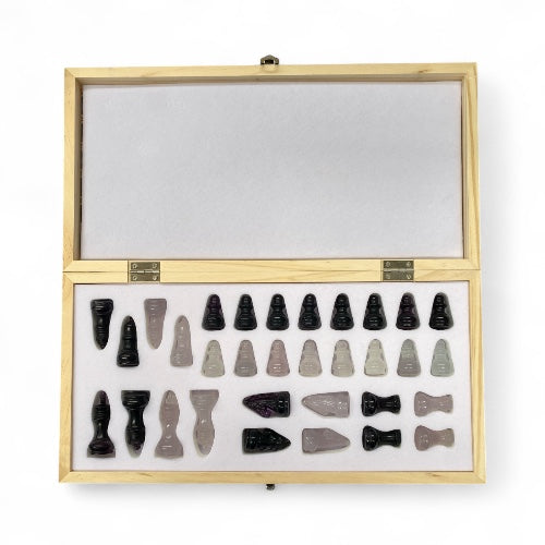 Kindred Crystal Collective — Fluorite Chess Set, full natural fluorite chess set with pastel and deep purple fluorite pieces on board, 34x17cm