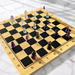 Kindred Crystal Collective — Fluorite Chess Set, close-up of hand-carved deep purple fluorite chess pieces showing natural translucence and colour zoning
