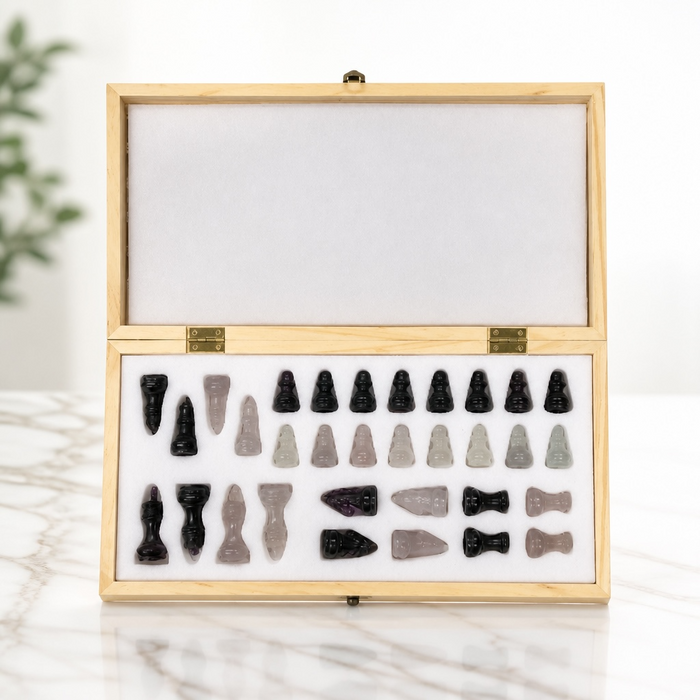 Kindred Crystal Collective — Fluorite Chess Set, full natural fluorite chess set with pastel and deep purple fluorite pieces on board, 34x17cm