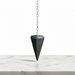 Natural hematite faceted pendulum in metallic silver-grey with mirror-like finish, used for dowsing, root chakra grounding and protection