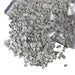 Kindred Crystal Collective — Howlite Chips 500g, soft white howlite chips with natural grey veining in a clear bag on white background