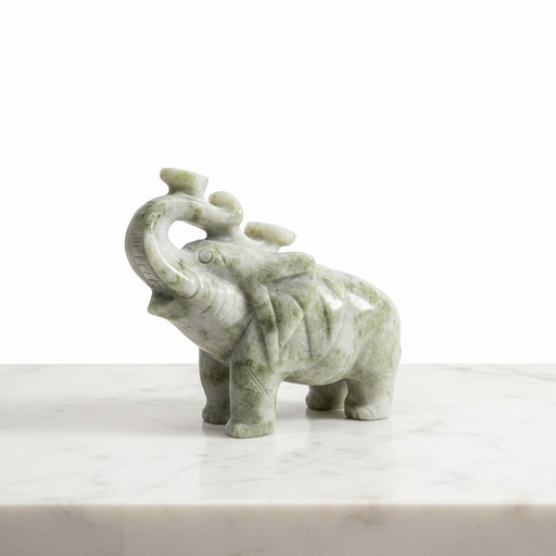 Natural pale green jade elephant carving 2.5kg, 20cm long, a feng shui crystal sculpture for luck, strength and good energy