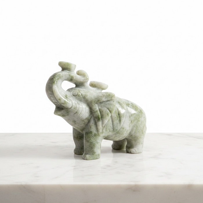 Natural pale green jade elephant carving 2.5kg, 20cm long, a feng shui crystal sculpture for luck, strength and good energy