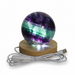 Colorful spherical light on a wooden base with USB cable on a white background