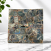 Kindred Crystal Collective — Labradorite Tile Purple Flash, angled view of polished labradorite tile showing shifting blue, gold and purple iridescent flash