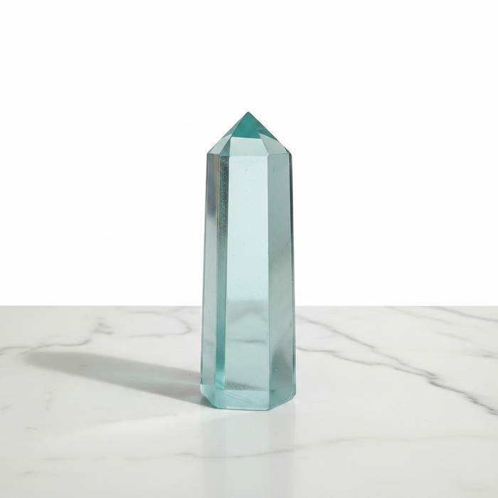 Kindred Crystal Collective — Light Blue Obsidian Generator, polished translucent aqua blue obsidian generator point