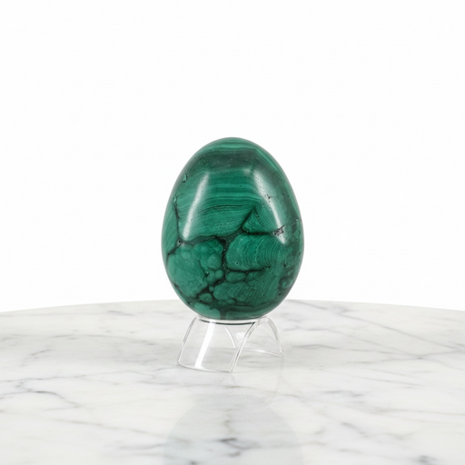 Natural malachite crystal egg in deep emerald green with swirling banded patterns, 585g, for transformation and heart chakra healing