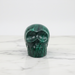 Large malachite crystal skull 278g with deep emerald green swirling formations, a one-of-a-kind collector's piece for spiritual transformation