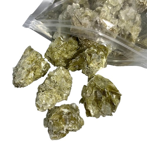Raw Mica rough in 1KG lots. A shimmering, layered mineral prized for its pearlescent beauty and reflective energy. Australia-wide shipping.