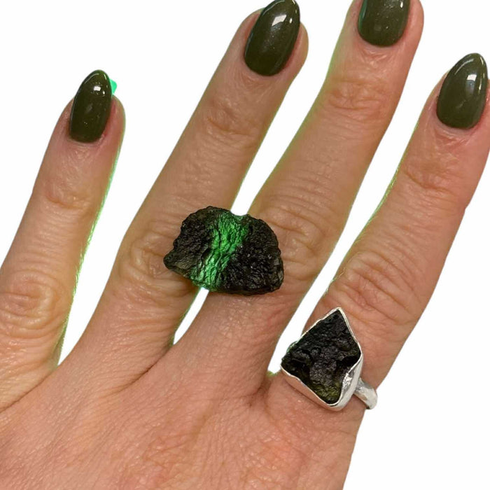 Moldavite raw specimen close-up showing distinctive green texture and natural formation, a high-vibration healing crystal from Czech Republic